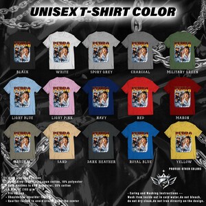 K&ouml;nnte beinhalten: Eine Auswahl an Unisex-T-Shirts in verschiedenen Farben, darunter Schwarz, Wei&szlig; und Marine. Jedes Shirt zeigt ein Grafikdesign mit dem Text "PEDRO" und einem Bild im Vintage-Stil. Die T-Shirts bestehen aus Baumwolle und Polyester.