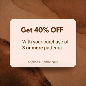 May include: A rectangular off-white sign with rounded corners featuring dark brown text that reads: Get 40% OFF With your purchase of 3 or more patterns. Applied automatically. The sign is set against a textured, abstract brown background.