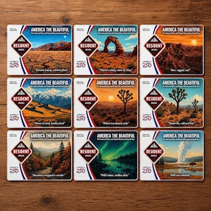 May include: Nine "America the Beautiful" annual park passes. Each pass features a different scenic landscape, including deserts, mountains, and arches. The passes have a Resident designation and the number 250.