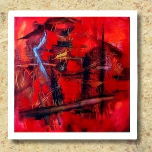 May include: Abstract painting with a vibrant red background, accented by black, blue, and gold brushstrokes. The artwork is framed in a white border, creating a striking contrast. The piece evokes a sense of energy and movement.