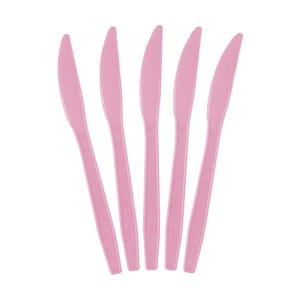 May include: Five pink plastic knives arranged vertically against a white background. Each knife has a serrated edge and a decorative pattern on the handle. The knives are a solid, light pink color.