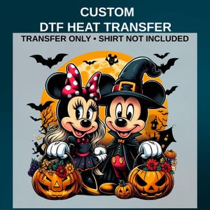 May include: A custom DTF heat transfer featuring a cartoon mouse couple in Halloween costumes with a large orange moon, bats, and jack-o'-lanterns. The text reads CUSTOM DTF HEAT TRANSFER and TRANSFER ONLY • SHIRT NOT INCLUDED.