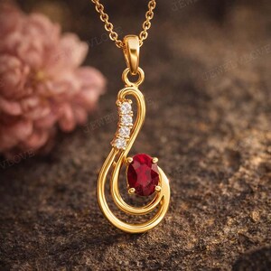 Collar con colgante de rubí en oro amarillo de 14 quilates con cadena. Collar ovalado con rubí y diamantes. Joyería de piedra natal de enero. Joyería elegante para aniversarios.