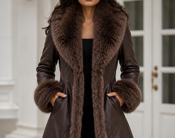 May include: A dark brown leather coat featuring a wide, plush faux fur collar that extends down the front opening. The coat includes long sleeves with thick faux fur cuffs and two side pockets, providing a structured and fitted silhouette.