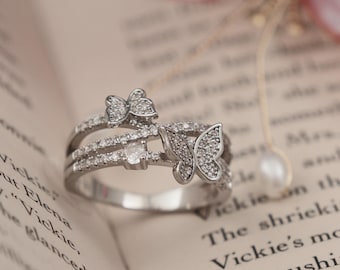 Anillo de mariposa de cobre chapado en oro blanco, joyería llamativa de doble banda con circonitas cúbicas engastadas.