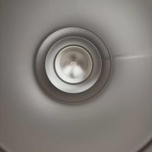 May include: A rustic wooden sign with the text "Welcome to our home" in white lettering. The sign has a distressed finish and a simple, inviting design, suitable for a front porch or entryway.