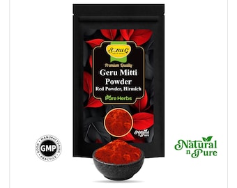 May include: A black pouch of Geru Mitti Powder, a red powder, with the text "Premium Quality Geru Mitti Powder Red Powder, Hirmich Pure Herbs". A small black bowl contains the red powder. The words "Natural n Pure" are also visible.