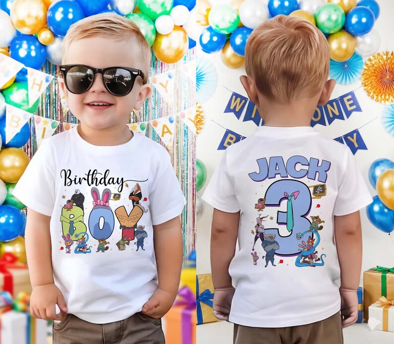 May include: A white t-shirt with the word "Birthday" above the word "BOY" in colorful letters, with cartoon characters. The back of the shirt says "JACK 3" in blue and purple, with cartoon characters. The boy is wearing sunglasses.