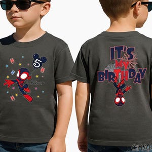May include: Charcoal grey t-shirt with a Spider-Man graphic and a balloon with the number 5. The front of the shirt has the name "Oliver" printed below the graphic. The back of the shirt says "IT'S MY BIRTHDAY" with a Spider-Man graphic.