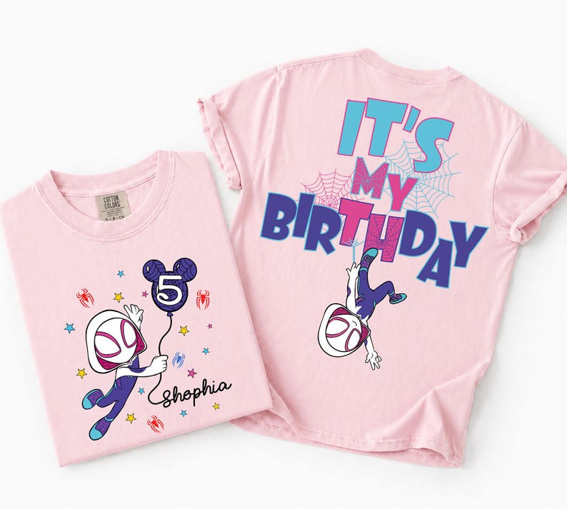 May include: Two light pink t-shirts. One features a cartoon character holding a balloon with the number 5, the name "Shophia", and spider web graphics. The other shirt has the text "IT'S MY BIRTHDAY" and a cartoon character.