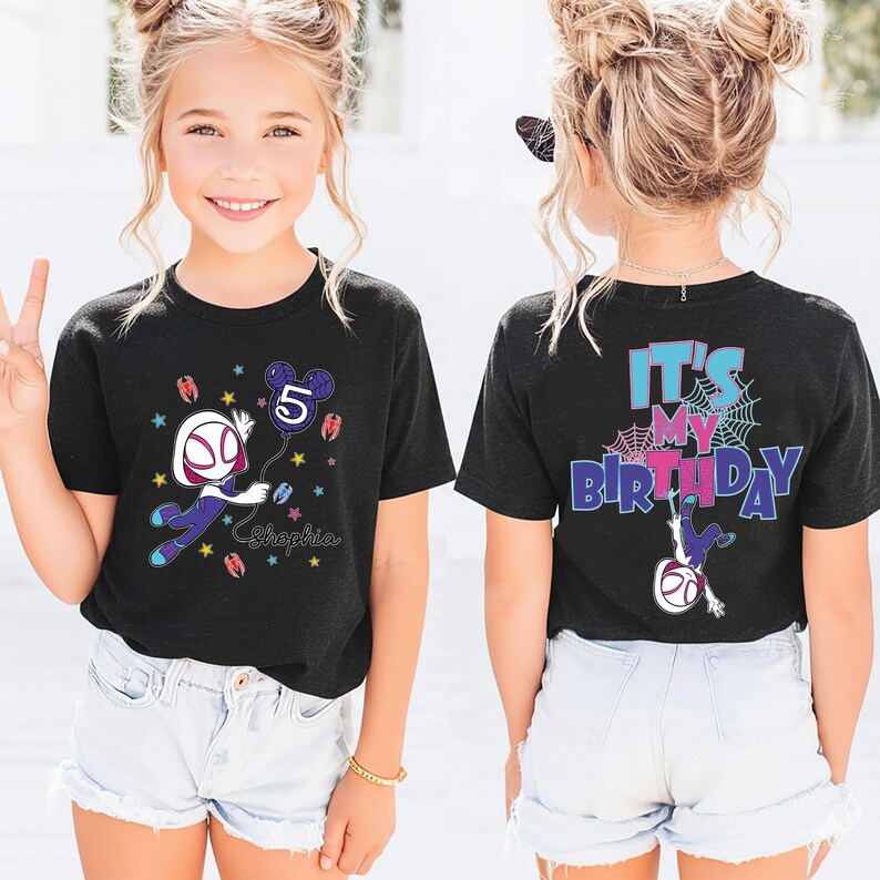 May include: Black t-shirt featuring a Spider-Gwen graphic holding a number 5 balloon and the name "Shopia". The back of the shirt says "It's My Birthday" with a Spider-Gwen graphic hanging upside down.