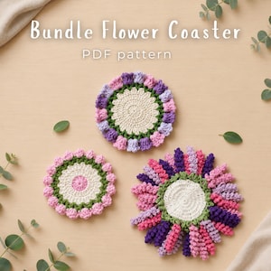May include: Three round crochet coasters featuring flower-inspired designs with cream, pink, purple, and green yarn. The text Bundle Flower Coaster PDF pattern is displayed at the top. Each coaster has a central circular base with textured edges.