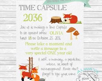 May include: A printable time capsule sign with a fox illustration and the text "Time Capsule 2036". The sign says "Join us in making a Time Capsule to be opened when Olivia turns 18 on October 23, 2036. Please take a moment and write a message to a very special ONE year old. A wish, a memory, a prediction, advice, or words of encouragement. Please don't forget to sign your name."