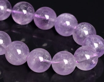May include: A purple amethyst gemstone bracelet with round beads.
