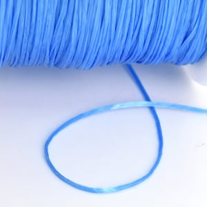 Cordon élastique bleu ciel de 0,8 mm / Fil de cristal 1 bobine 60 mètres Options de lot en gros (61087-S2028)