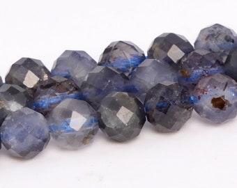 May include: A strand of faceted blue and gray gemstone beads. The beads are round and have a slightly iridescent finish.