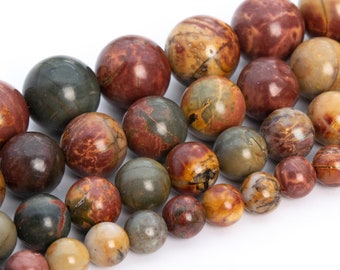 May include: A strand of round, multi-colored gemstone beads. The beads are a mix of brown, red, yellow, and green with intricate patterns.