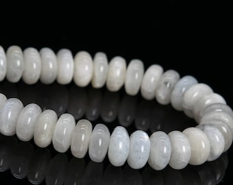May include: A white moonstone bead bracelet with a smooth, polished finish. The beads are round and have a subtle shimmer.