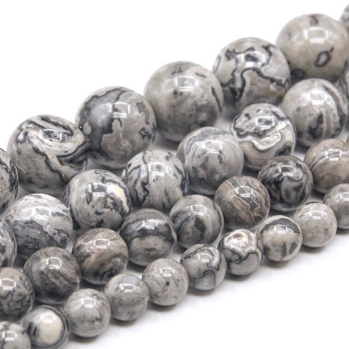 thumbnail interactive-video image 1 of Grade AAA Natural Gray Crazy Lace Jasper Round Beads – 4mm To 16mm Sizes 1 of 5