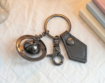 Spinning Ball Sleutelhanger Cadeau voor Mannen Vrouwen Brons Draaiende Saturnusring Autosleutels