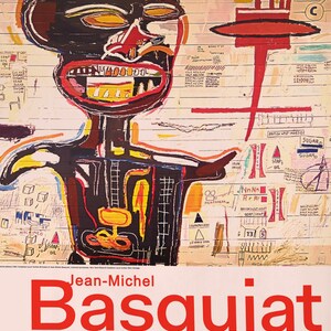 May include: A colorful Jean-Michel Basquiat art print. The artwork features a black figure with a large open mouth and a red face. The background is a mix of white, yellow, and brown with various text and symbols. The artist's name and the word "Basquiat" are in red.