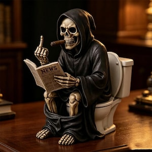 May include: A figurine of a skeleton wearing a black hooded robe, sitting on a white toilet. The skeleton holds a newspaper with the word NEWS printed on the cover, has a cigar in its mouth, and is gesturing with its middle finger raised.