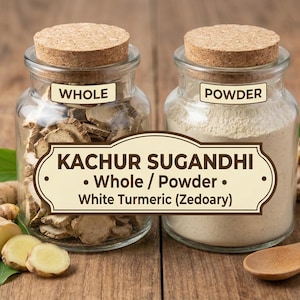 May include: Two glass jars with cork lids, one labeled "WHOLE" and filled with dried ginger slices, the other labeled "POWDER" and filled with a fine, light-colored powder. The text on the label reads "KACHUR SUGANDHI - Whole / Powder - White Turmeric (Zedoary)".