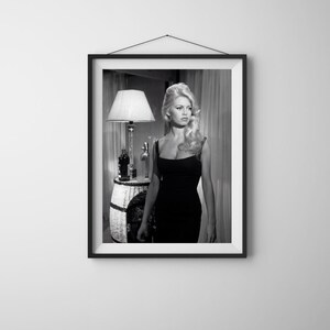 May include: A rustic wooden sign with the text "Welcome to our home" in white lettering. The sign features a distressed finish and a simple, inviting design, perfect for front door decor.