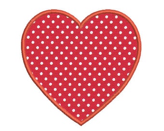 May include: A red heart with white polka dots and an orange outline.