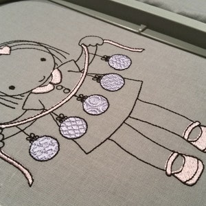 May include: A black and white line drawing of a girl holding a string of ornaments. The ornaments are a light gray color and have a textured pattern. The girl is wearing a pink heart on her head.