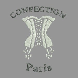 May include: A white embroidered corset with a lace-up front, surrounded by the text "CONFECTION PARIS" in gray embroidery.