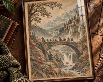 May include: A framed rectangular print depicting a group of nine figures walking across a stone bridge in a mountainous landscape. The scene features a waterfall, a castle on a cliff, and a pale sun in a soft-toned, detailed illustration.