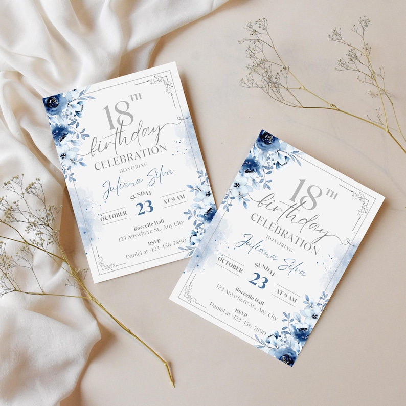 May include: Two invitations for an 18th birthday celebration. The invitations feature a white background with blue floral accents and text. The text includes the name "Juliana Silva", the date, time, and RSVP information.