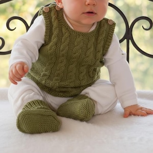 May include: A set of three ceramic mugs with a speckled, matte finish. The mugs are in shades of cream, light gray, and dark gray. Each mug has a simple, minimalist design, perfect for coffee or tea.