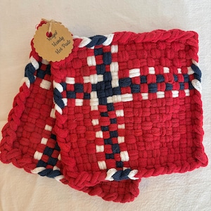 May include: A set of three ceramic mugs with a speckled, matte finish. The mugs are in shades of cream, light gray, and dark gray. Each mug has a simple, minimalist design, perfect for coffee or tea.