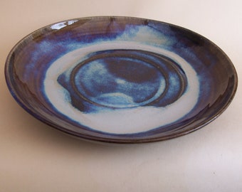 Serving or fruit bowl. With blue beige  glaze.