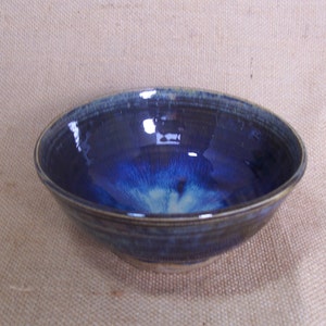 Breakfast bowl with blue beige glaze. Ceramics stoneware pottery.