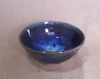 Breakfast bowl with blue beige glaze. Ceramics stoneware pottery.