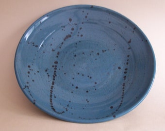 Serving or fruit bowl. With turquoise glaze and iron oxide decoration.