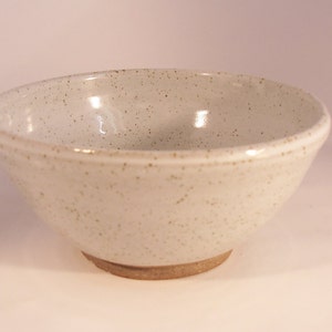Breakfast bowl with speckled white glaze.