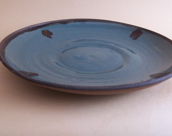 Serving or fruit bowl. With turquoise glaze and iron oxide decoration.