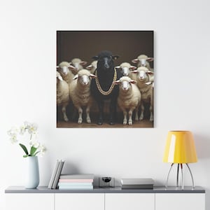 May include: A canvas print featuring a black sheep wearing a gold chain, standing among several white sheep. The image has a humorous and bold theme, with the black sheep as the focal point.