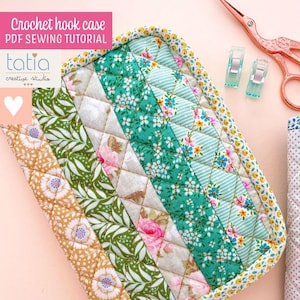 May include: A patchwork crochet hook case with floral and geometric patterns in green, pink, and gold. The case has a yellow floral border. The text "Crochet hook case PDF SEWING TUTORIAL" is at the top. A pink reel of thread and scissors are also visible.