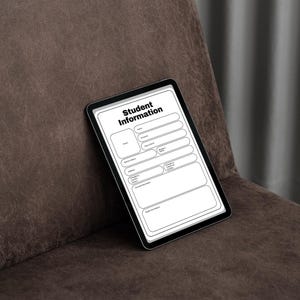 May include: A black tablet displaying a "Student Information" form. The form includes fields for name, date of birth, and emergency contact information. The tablet is resting on a brown leather chair.