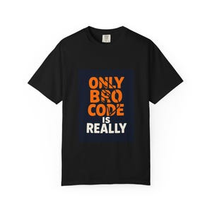 May include: Black t-shirt featuring the text "ONLY BRO CODE IS REALLY" in orange and white. The text is set against a navy blue backdrop. The shirt has a crew neck and short sleeves.