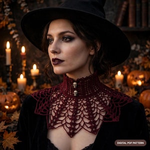 May include: A dark red crochet collar featuring a high neck with two small skull-shaped buttons. The collar has an intricate web-like pattern that drapes over the shoulders. The image includes the text Digital PDF Pattern.