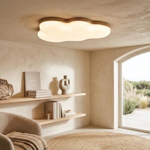 May include: A set of three ceramic mugs with a speckled, matte finish. The mugs are in shades of cream, light gray, and dark gray. Each mug has a simple, minimalist design, perfect for coffee or tea.