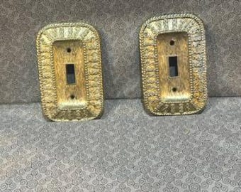 Par de tapas metálicas (de latón) para interruptores de luz, estilo vintage de 1968.