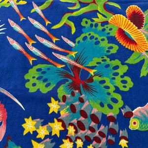 May include: A white ceramic mug with a black handle and the text "But First, Coffee" in a handwritten style. The mug is on a white surface. The mug is 4 inches tall.