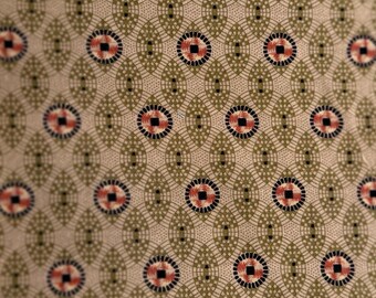Vintage reproduction 19th Century cotton print in olive and tan